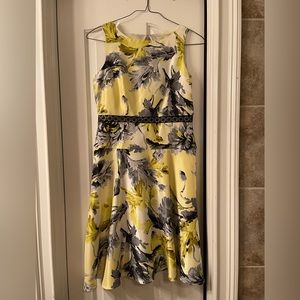 Yellow print polyester dress with cut out back. Dress barn size 12. Machine wash